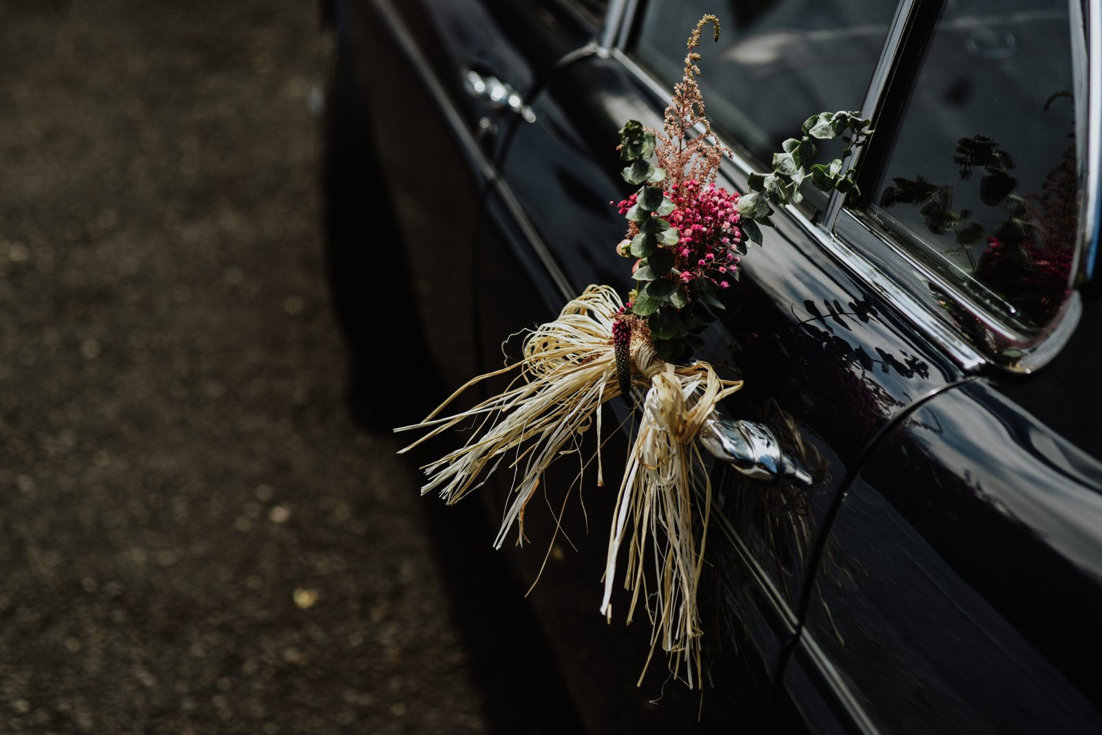 Bouquet of flowers decoration for the official car of the bride and groom on the wedding day